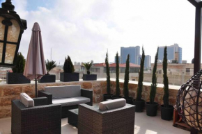 Spectacular 1 BR rooftop with private Terrace